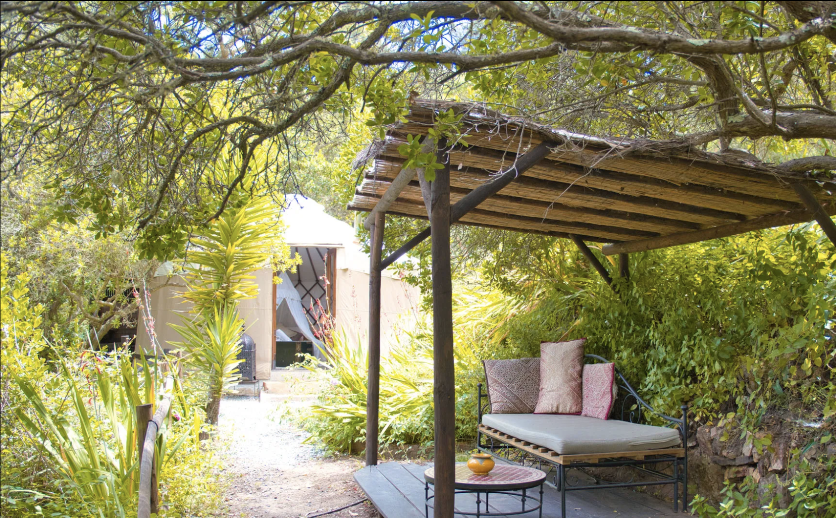 Aterra yurt outdoor lounge under pergola